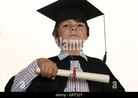 Little Boy With Mortarboard And Diplom Stock Photo