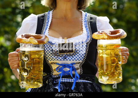 Waitress In A Beergarden Stock Photo