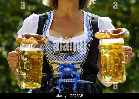 Waitress In A Beergarden Stock Photo