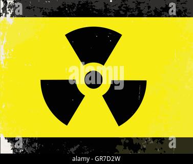 A worn Caution Radiation symbol in yellow and black Stock Vector