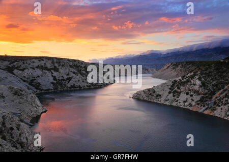 Bridge A1 highway Maslenica at cloudy colorful sunset Stock Photo