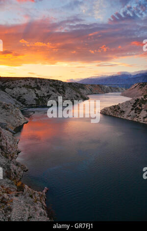 Bridge A1 highway Maslenica at cloudy colorful sunset Stock Photo