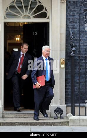 Defence Secretary Michael Fallon leaves 10 Downing Street, London, for a Cabinet meeting, as European Union migrants will need to secure a job before they are allowed to move to Britain under proposals reportedly being considered by Theresa May.