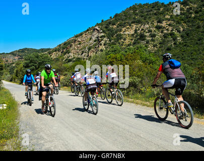 Bikers On The Cycle Path Greenway Via Verde De La Sierra Between Coripe And Olvera, Andalucia, Spain Stock Photo
