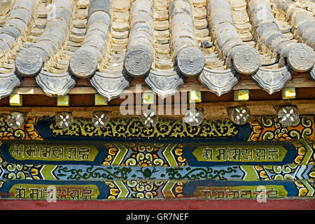 Traditional Unglazed Chinese-Style Roof Tiles And Ornamental Front Wall Painting Of The Dalai Lama Temple, Erdene Zuu Monastery, World Heritage Site Orkhon Valley, Kharkhorin, Mongolia Stock Photo