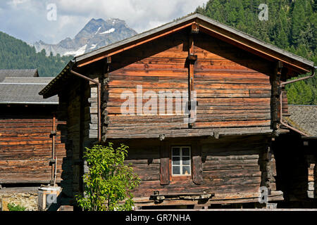 Valaisian Chalets, Peak Ofenhorn Behind, Binn, Binntal Valley, Valais, Switzerland Stock Photo