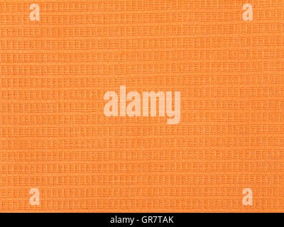 Bright orange waffle texture cotton fabric background Stock Photo