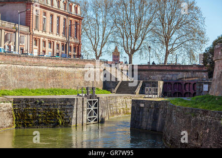 Old gates to Canal du Midi between Garonne River and sea, Toulouse, France Stock Photo