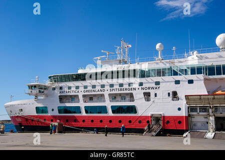 Hurtigruten MS Fram explorer cruise ship docked on the quayside in the port of Sisimiut (Holsteinsborg), Qeqqata, West Greenland Stock Photo