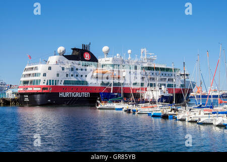 Hurtigruten MV Fram expedition explorer cruise ship docked in port with yachts in the marina. Reykjavik, Iceland Stock Photo