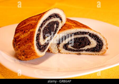 Poppy Beigli Or Poppy Seed Roll With Dried Plums, An Old-Fashioned Hungarian Christmas Cookies Stock Photo