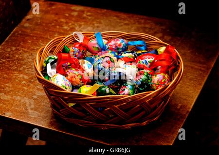 Colorful Easter Eggs In Basket Stock Photo