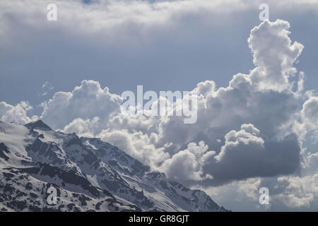 Impressive Clouds Drift In The Urner Alps From Sustenpass Stock Photo