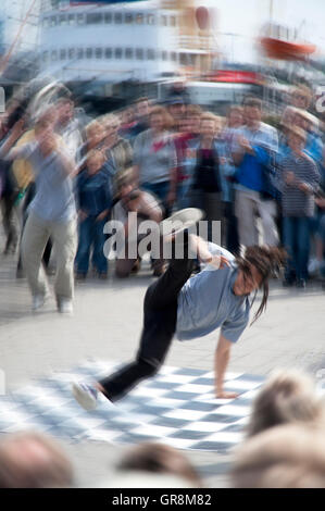 Breakdancer Performing On The Street Stock Photo