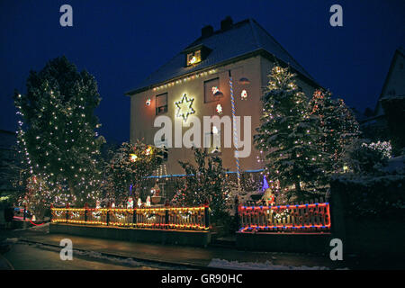 Lighted Christmas House In Coburg In Bavaria Stock Photo