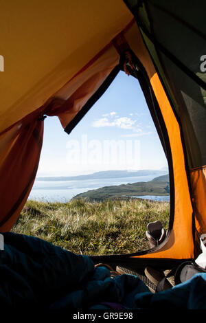 View from inside tent  looking across Sound of Raasay, Isle of Skye, Scotland, United Kingdom Stock Photo