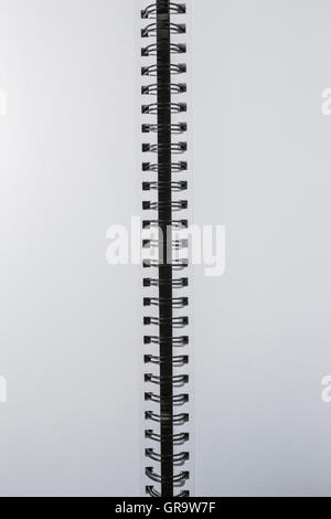 Pages and spiral binding of a blank white notebook. Stock Photo