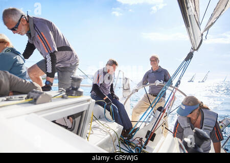 Retired friends sailing Stock Photo