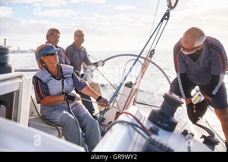Retired friends sailing Stock Photo