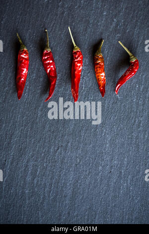 Chilis On A Slate Platter Stock Photo