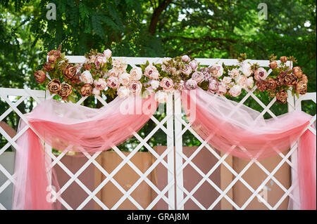 beautiful wedding arch in the park for the ceremony Stock Photo