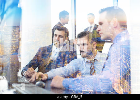 Business team working in conteporary corporate office. Stock Photo