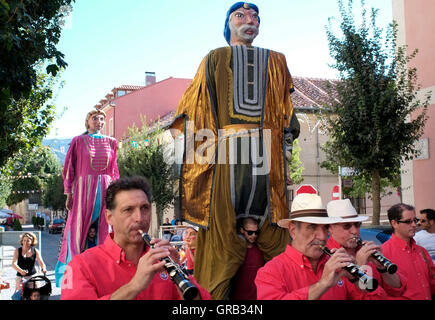 People parade through La Granja de San Ildefonso during a festival, in Spain August 21, 2016.  Copyright photograph John Voos Stock Photo