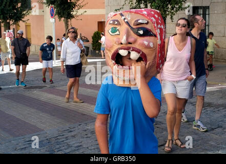 People parade through La Granja de San Ildefonso during a festival, in Spain August 21, 2016.  Copyright photograph John Voos Stock Photo