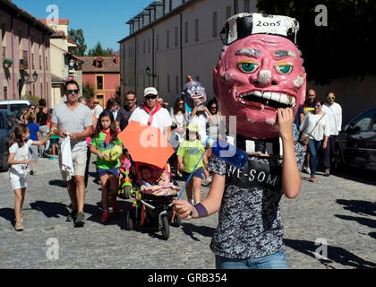 People parade through La Granja de San Ildefonso during a festival, in Spain August 21, 2016.  Copyright photograph John Voos Stock Photo