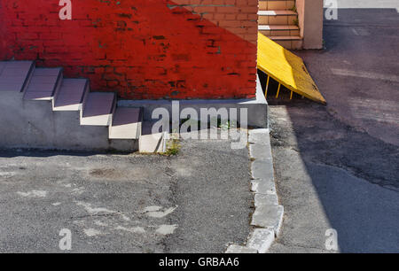 Abstract city background with stairway and red wall Stock Photo