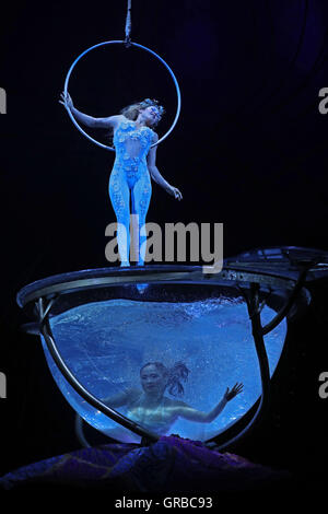 Artists perform on stage during a dress rehersal for Cirque Du Soleil's Amaluna prior to its opening on Wednesday in the big top at Manchester's Trafford Centre. Stock Photo