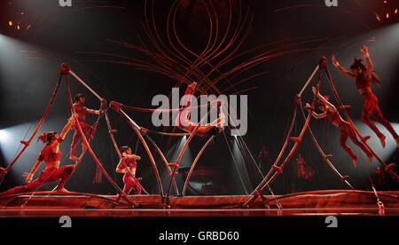 Artists perform on stage during a dress rehersal for Cirque Du Soleil's Amaluna prior to its opening on Wednesday in the big top at Manchester's Trafford Centre. Stock Photo