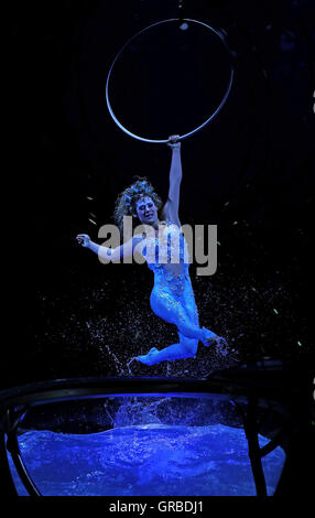 Artists perform on stage during a dress rehersal for Cirque Du Soleil's Amaluna prior to its opening on Wednesday in the big top at Manchester's Trafford Centre. Stock Photo