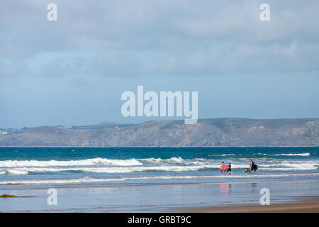 Body boarding on Druidstone Beach in Pembrokeshire Stock Photo