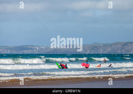 Body boarding on Druidstone Beach in Pembrokeshire Stock Photo