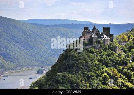 Schönburg Castle Situated On A Hill Above Town Oberwesel In Mystic Light, Upper Middle Rhine Valley, Germany Stock Photo