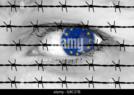 Flag Of Eu In A Woman S Eye Behind Barbed Wire Stock Photo