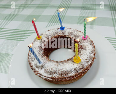 Birthday Cake With Burning Candles On It, The Fifth Birthday Stock Photo