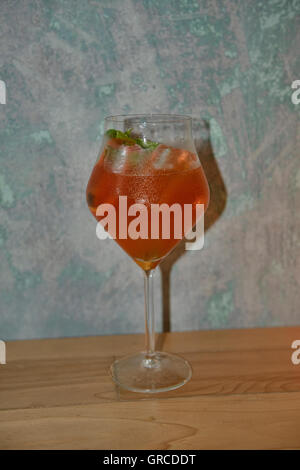 Thai iced tea gin and tonic at a bar in Chinatown, Bangkok, Thailand Stock Photo