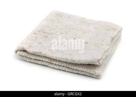 Folded rough cleaning rag isolated on white Stock Photo