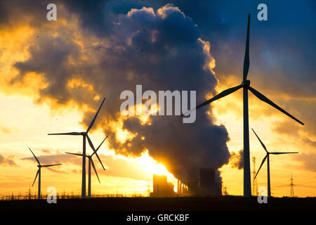 Coal-Fired Power Plant Niederaußem  Nrw Wind Farm In Backlight