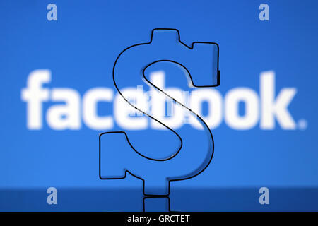 Us Dollar Sign With Facebook Sign Stock Photo