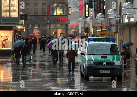 Police Car In Operation In Downtown Cologne Stock Photo