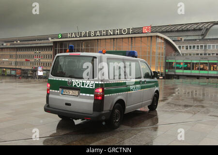 Police Car In Operation In Downtown Cologne Stock Photo