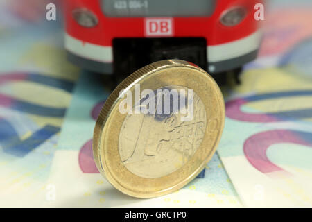 Railway Ticket Fares Increase Regional Commuter Train With Euro Bills And Coin Stock Photo