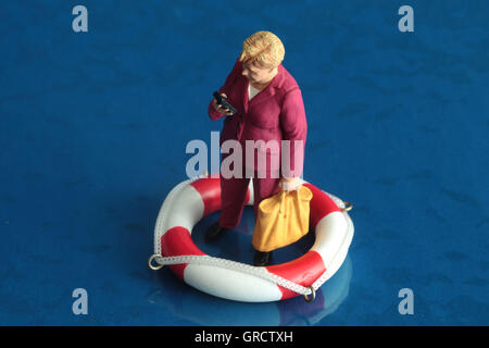 Chancellor Angela Merkel Of Germany Walking On Water Stock Photo