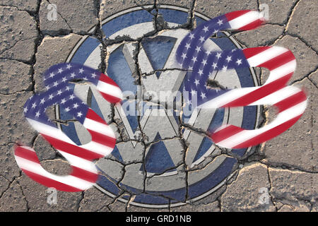 Crisis At Volkswagen Vw Sign On Eroding Road With Paragraph And Stars And Stripes Stock Photo
