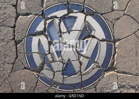 Crisis At Volkswagen Vw Sign On Eroding Road Stock Photo