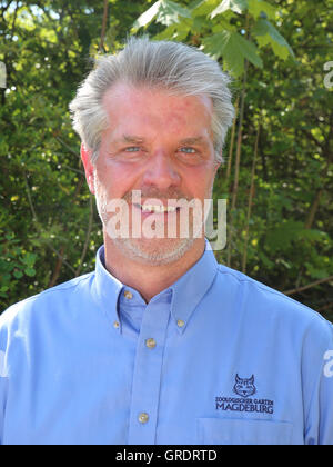 Zoo Director Dr. Kai Perret Presents White Lion Cubs At Zoo Magdeburg Stock Photo