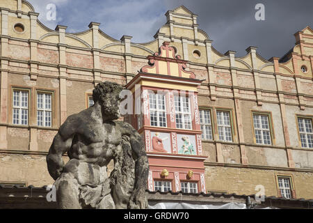 Weathered Men Statue In Front Of The Castle Of Bernburg Saxony-Anhalt Stock Photo